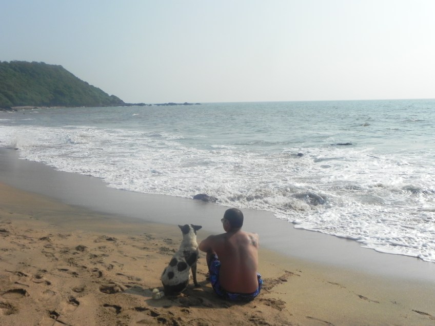 Cola Beach friends with a dog goa india