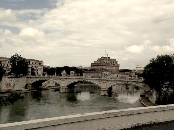 Overlooking st angelo from the bridge of the rive the river in rome