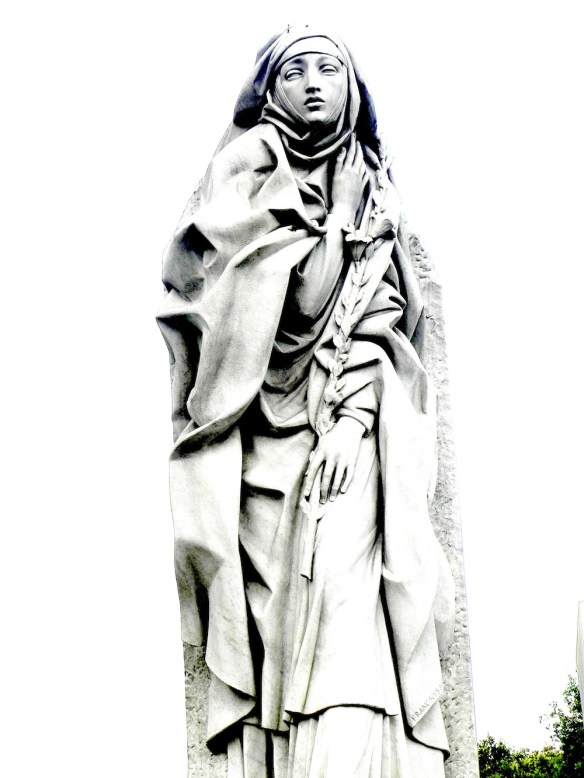 a beautiful yet very sad looking white statue nearby the st angelo in rome italy