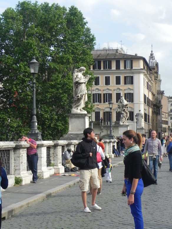 tourists walking at the saint angelo entrance