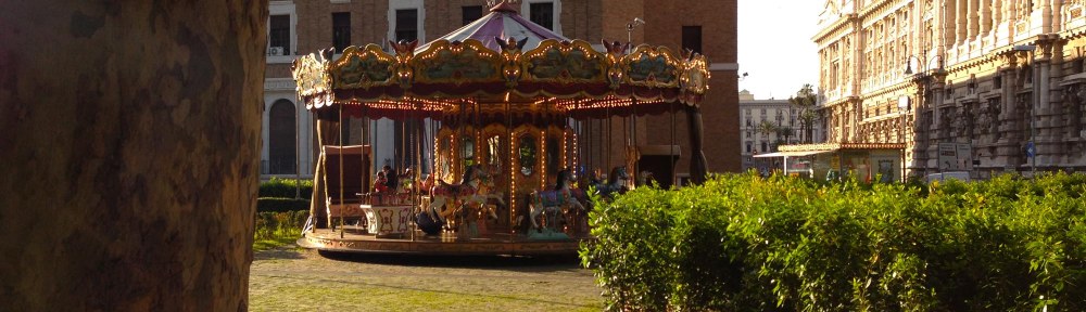 it is time for marry go round by the river tevere in rome on a stunning sunny day