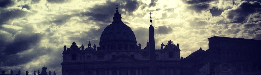 a picture of the shadow of the vatican city in rome formed by the sunset sundown effects