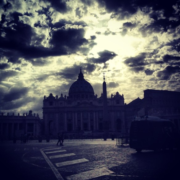 a picture of the shadow of the vatican  city in rome formed by the sunset sundown effects  