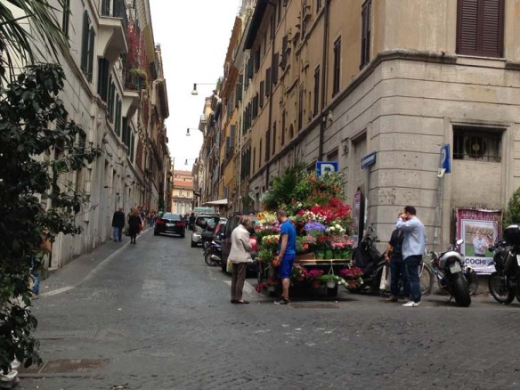 A neighborhood street view with people
