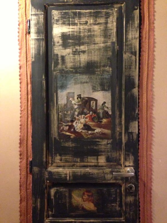 Art and paint on a wall inside a shop in Rome 