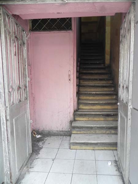 Pink wall antique entrance stairway at Al Balad downtown Amman Jordan