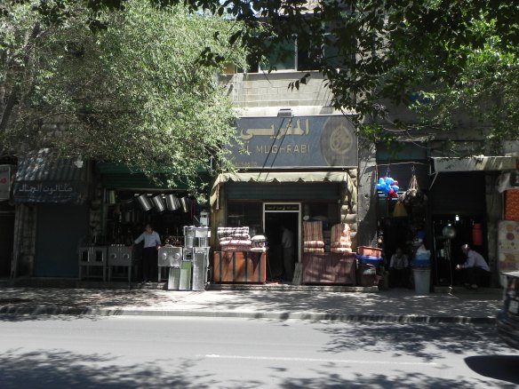 An old shop between trees in al balad downtown Amman