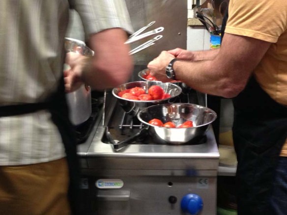 Making Tomato sauce during Italian cooking class 