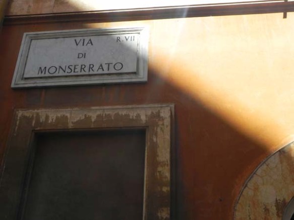 the street name sign on a wall in rome
