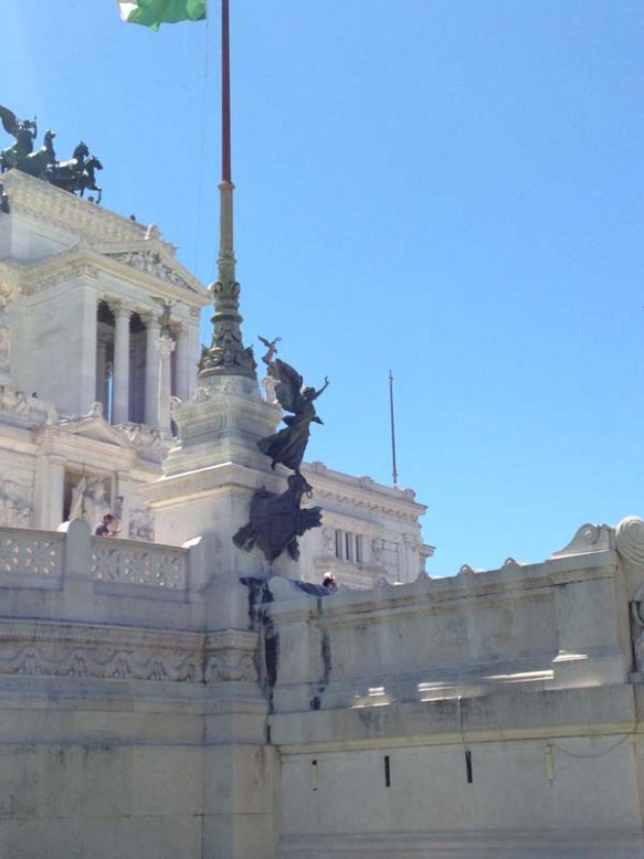 my favorite statue of an angel looking out at piazza venezia rome italy