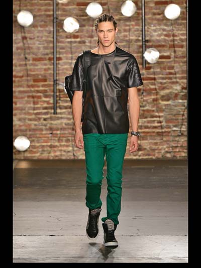 green pants and leather shirt