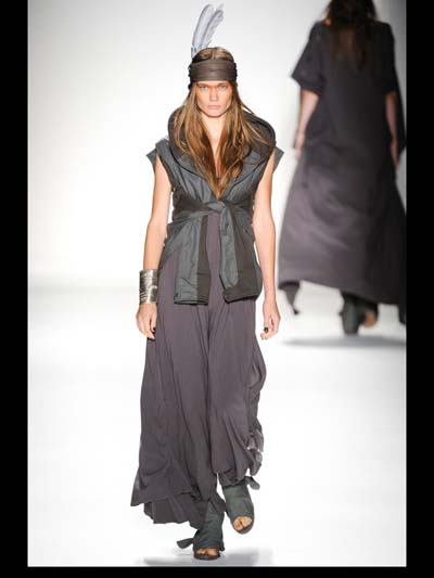 vest over grey dress