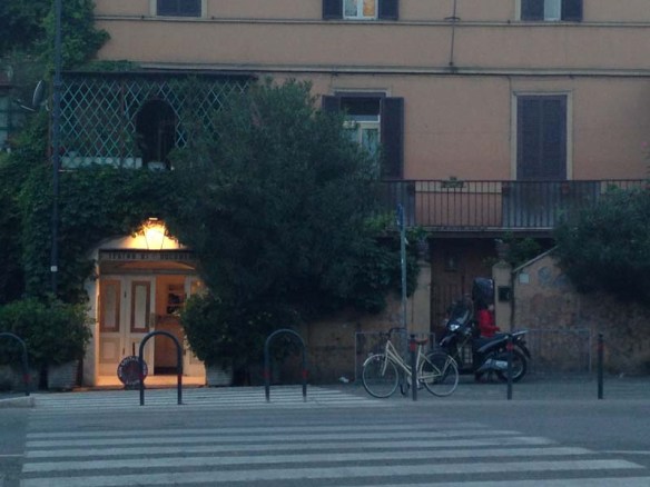 At Testaccio rome for dinner front picture of a restaurant and a bike 
