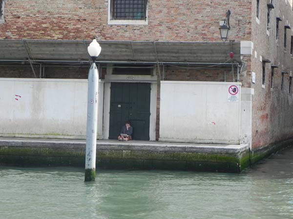 Doors are beautiful in Venice, they speak to you. Italian Architecture is beautiful, a lonely man or woman sitting by the front side of the doorstep