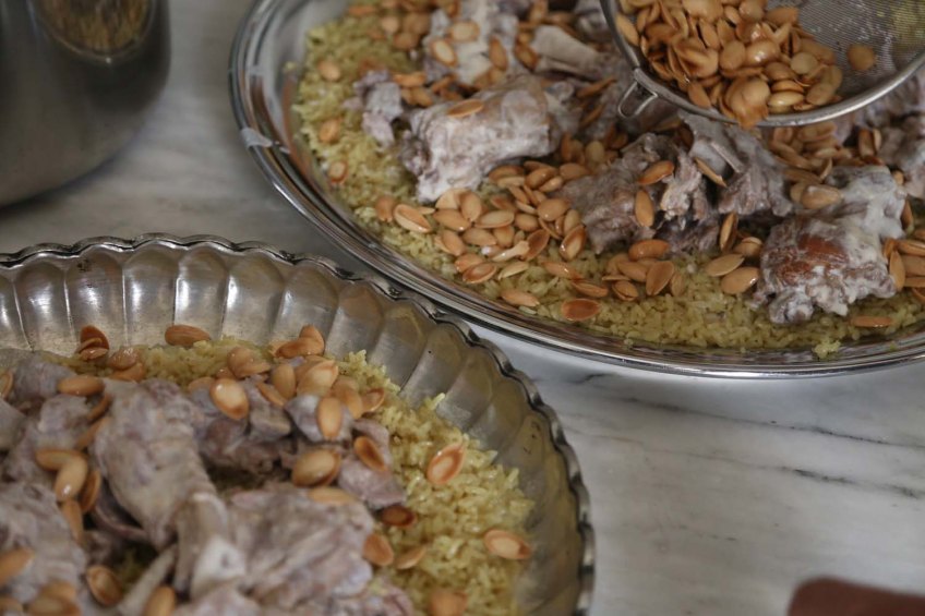 Making Mansaf Recipe rice lamb almond pine nuts