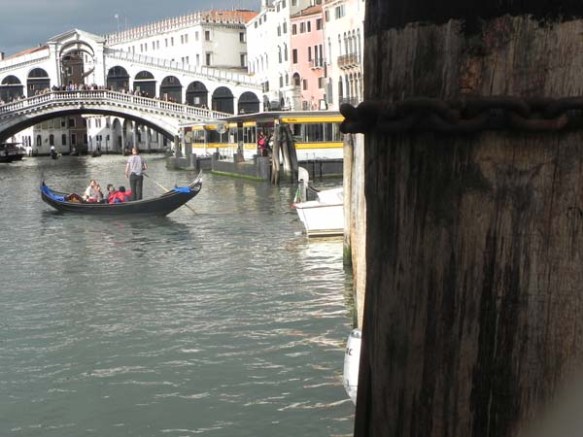 A gondola and a gondolier at the Grand Canal