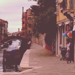 Mother child balloons infront of a shop in venice venezia grand canal love