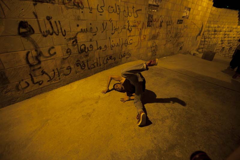 dancer during our photography project at this ghetto area in amman webdeh jordan jadal culture with dimmed street light