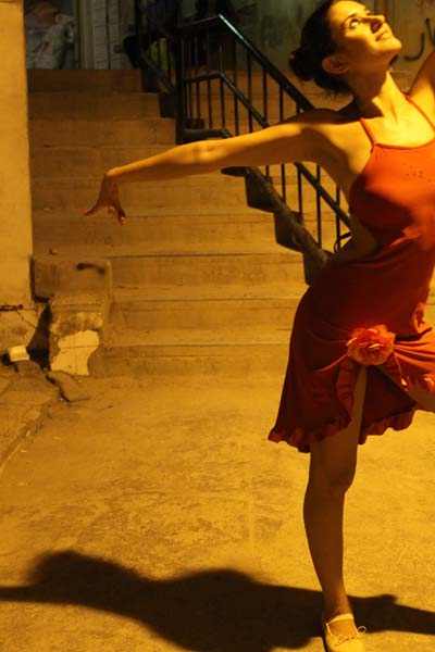 Ballet dancer during our photography project at this ghetto area in amman webdeh jordan jadal culture with dimmed street light