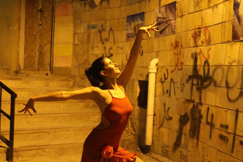Ballet dancer during our photography project at this ghetto area in amman webdeh jordan jadal culture with dimmed street light