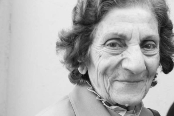 Old jordanian woman posing with wrinkles and close up look into her personality