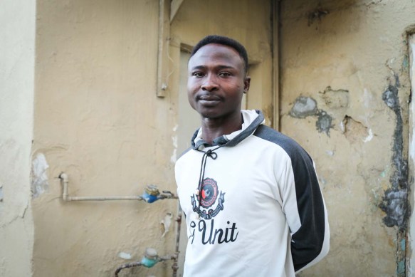 A photograph of an african looking man who is based in Jordan at the webdeh neighborhood 