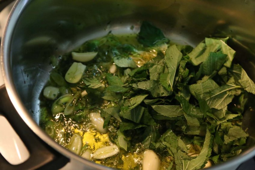 Making Molokhiah middle-eastern dish