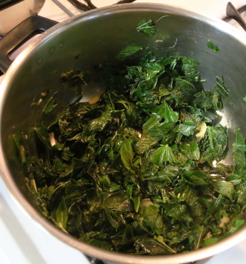 Making Molokhiah middle-eastern dish