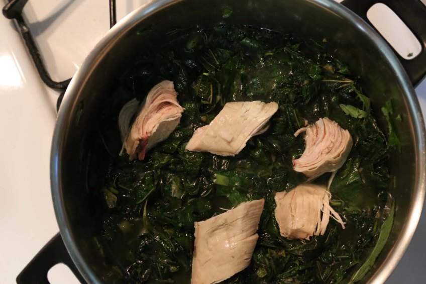 Making Molokhiah middle-eastern dish