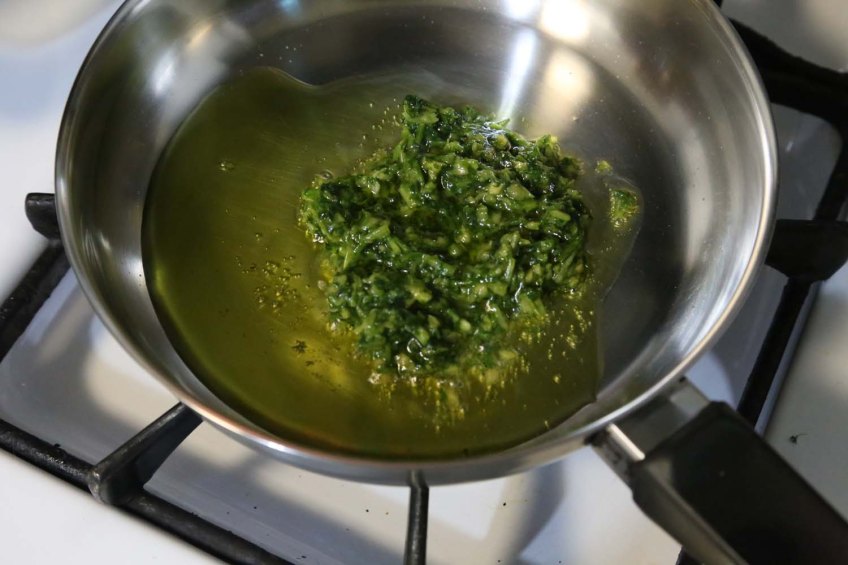 Making Molokhiah middle-eastern dish