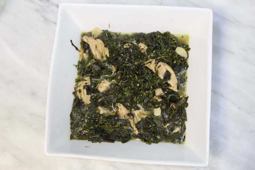 Making Molokhiah middle-eastern dish