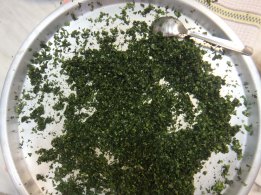 Making Molokhiah middle-eastern dish