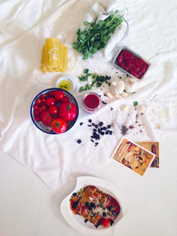 A photograph of Cannelloni pasta fresh tomato's garlic tomato paste and minced meat