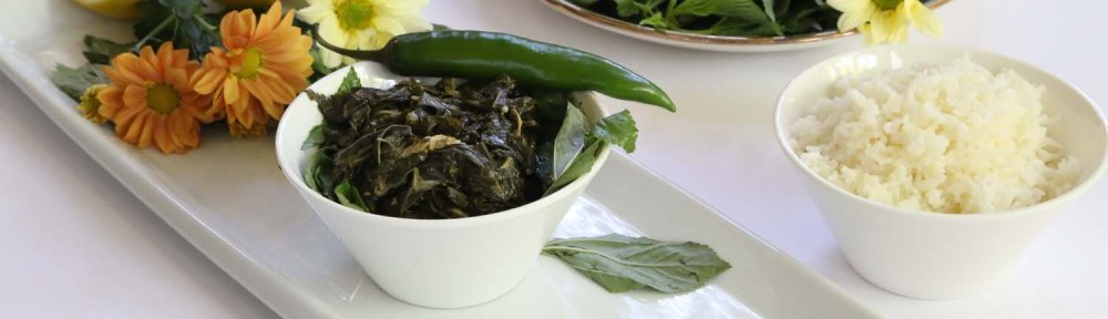 A Middle-Eastern Aranian dish Mulukhiah Mloukhieh green leaves vegetables with rice