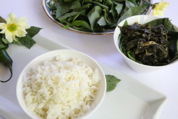 A Middle-Eastern Aranian dish Mulukhiah Mloukhieh green leaves vegetables with rice