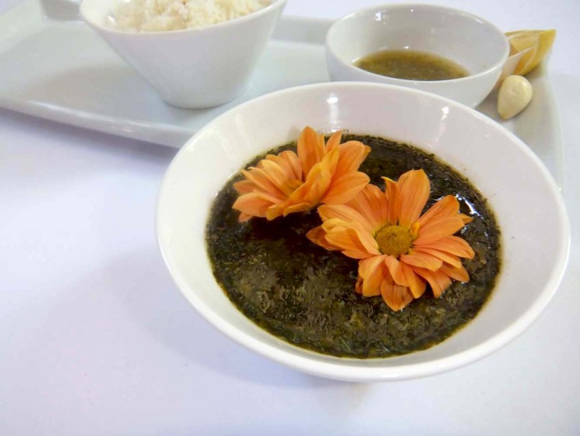 Making Molokhiah middle-eastern dish