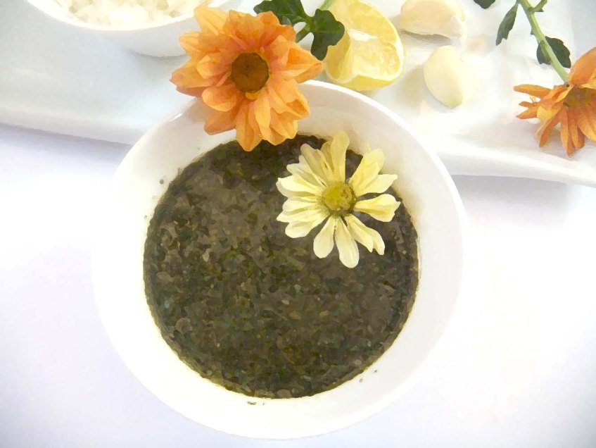 A Middle-Eastern Aranian dish Mulukhiah Mloukhieh green leaves vegetables with rice
