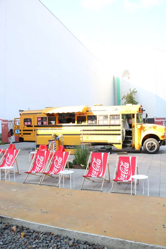 Yellow bus and cola bus