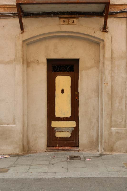 Brown antique door Streets of barcelona artsy