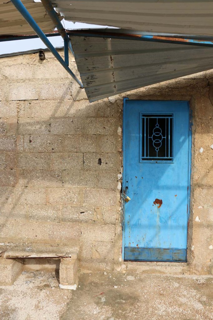 Al Salt, AsSalt, Al-Salt, AlSalt, Jordan, a photograph of an old blue door