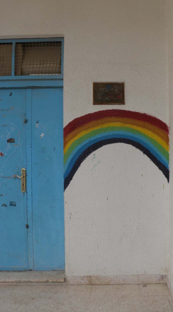 United nations school for the Jerash Refugee camp with rainbow drawing on the wall