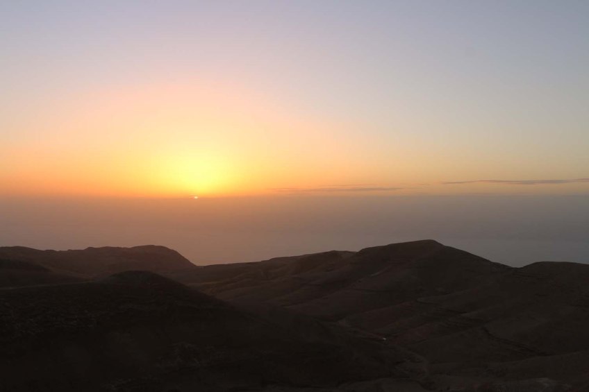 The historic ancient attraction in Jordan of the Mukawir Fortress Sunset
