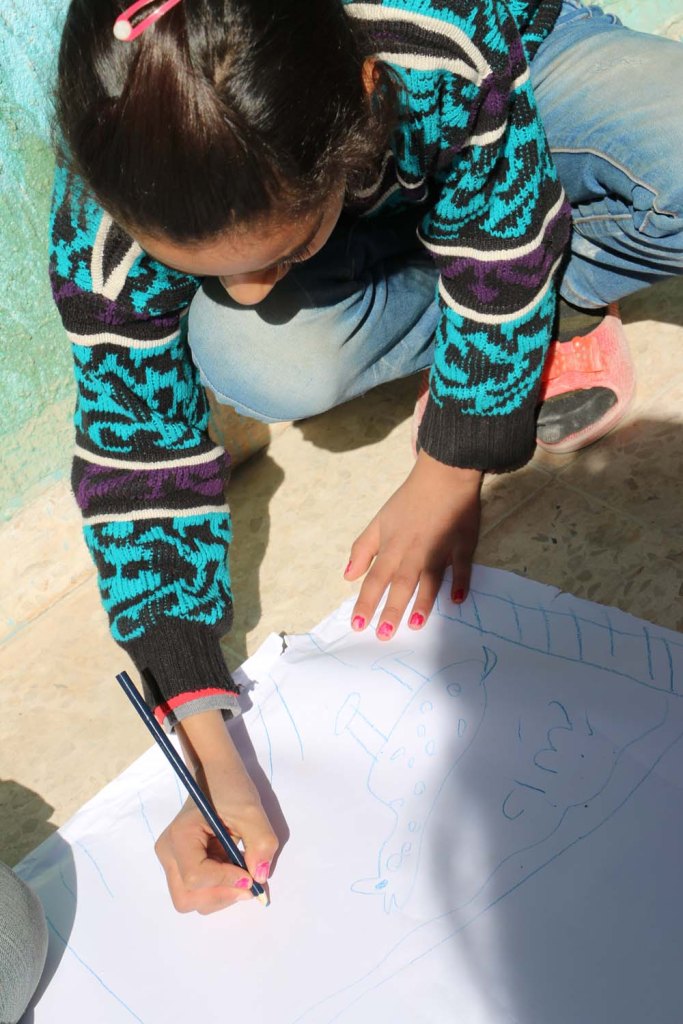 Refugee kids drawings what makes them happy at the jarash gaza refugee camp