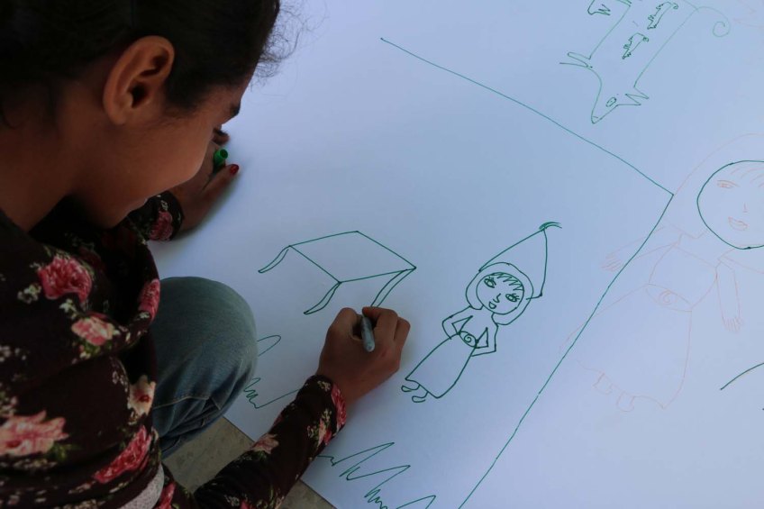 Refugee kids drawings what makes them happy at the jarash gaza refugee camp