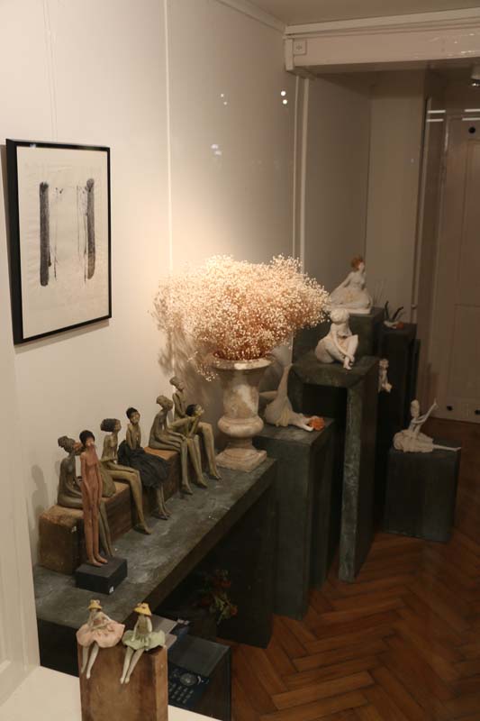 Artist sculptures of small ladies made with clay