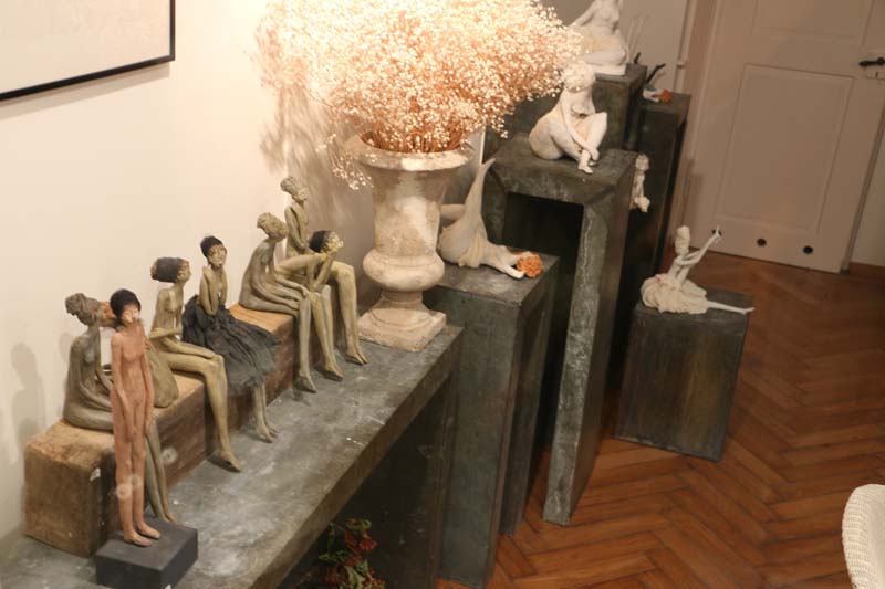 Artist sculptures of small ladies made with clay