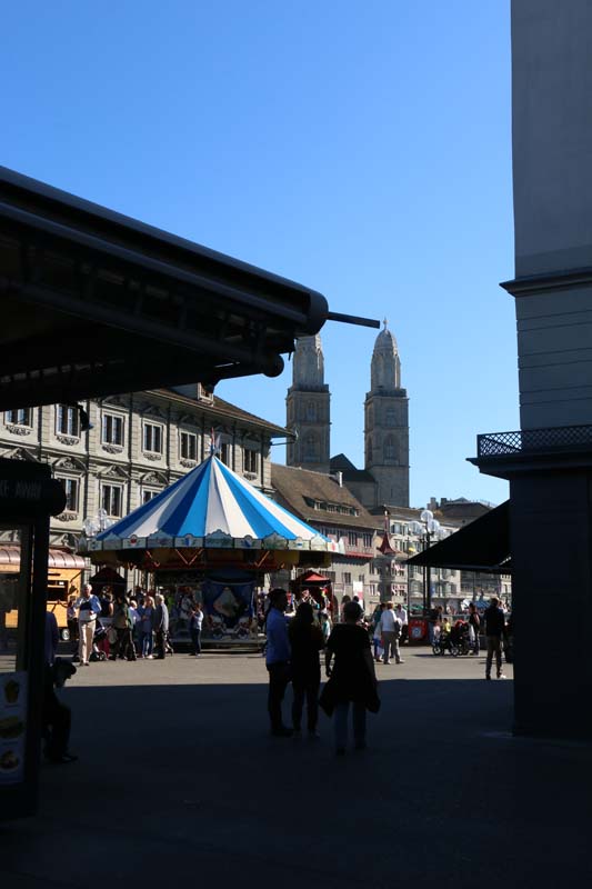 Marry go round A photograph of green old building in Zurich Altstadt old town first district