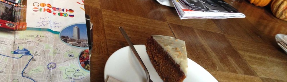 Carrot cake map camera and a coffee