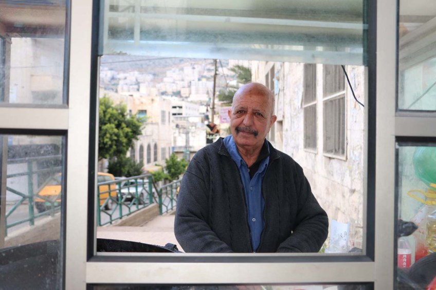 A portrait of a man making falfel in Nablus