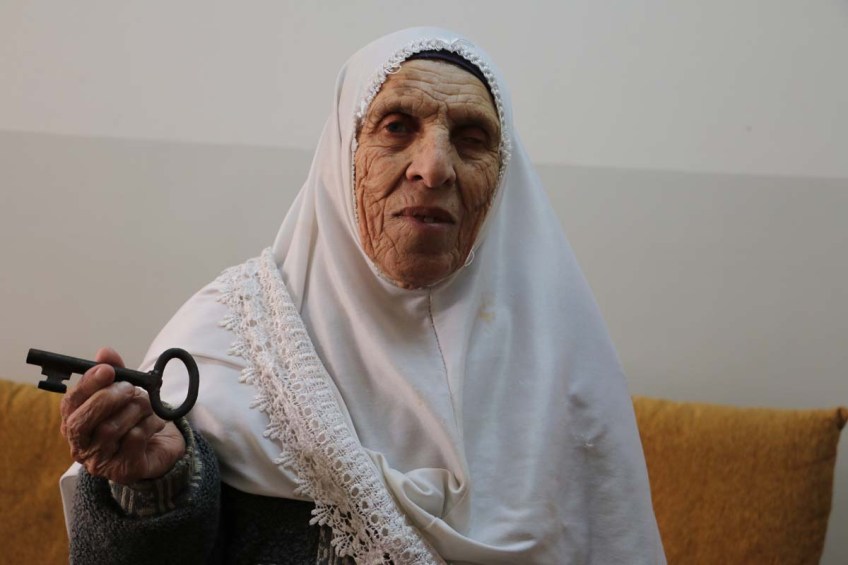 An old Palestinian woman hoping to return to her occupied home one day